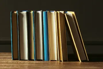 Row of finished hardcover publications