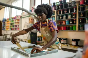 Designer preparing artwork for print production